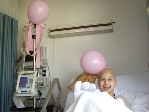 Me and Ricco (my IV pump) get decorated for my last hospital chemo party!